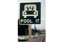 G2_395px-_pool_it__sign_north_of_vancouver__washington__was_a_reminder_that_the_gasoline_shortage_was_not_over_in_march__1974_and_sharing_rides_was_a_good_idea_03-1974